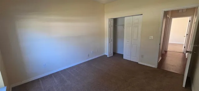 an empty room with closet