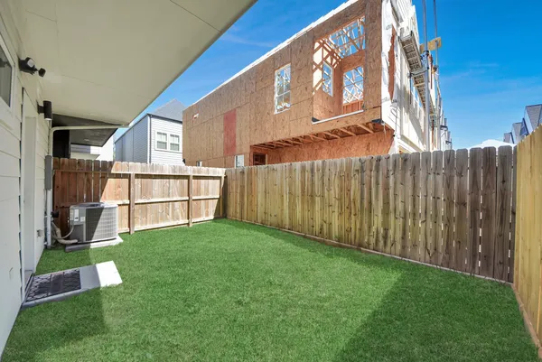 a view of backyard with a small cabin