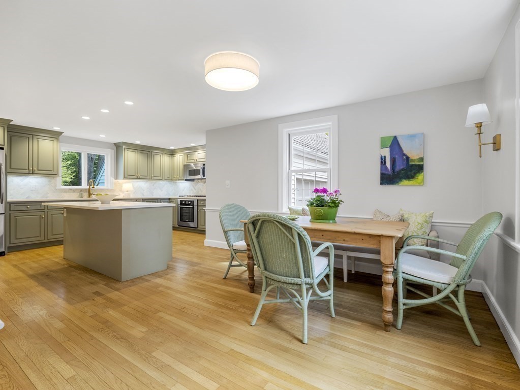 48 Fuller Brook Road Wellesley, MA 02482 - Photo 6 of 16 a view of a dining room with furniture and wooden floor