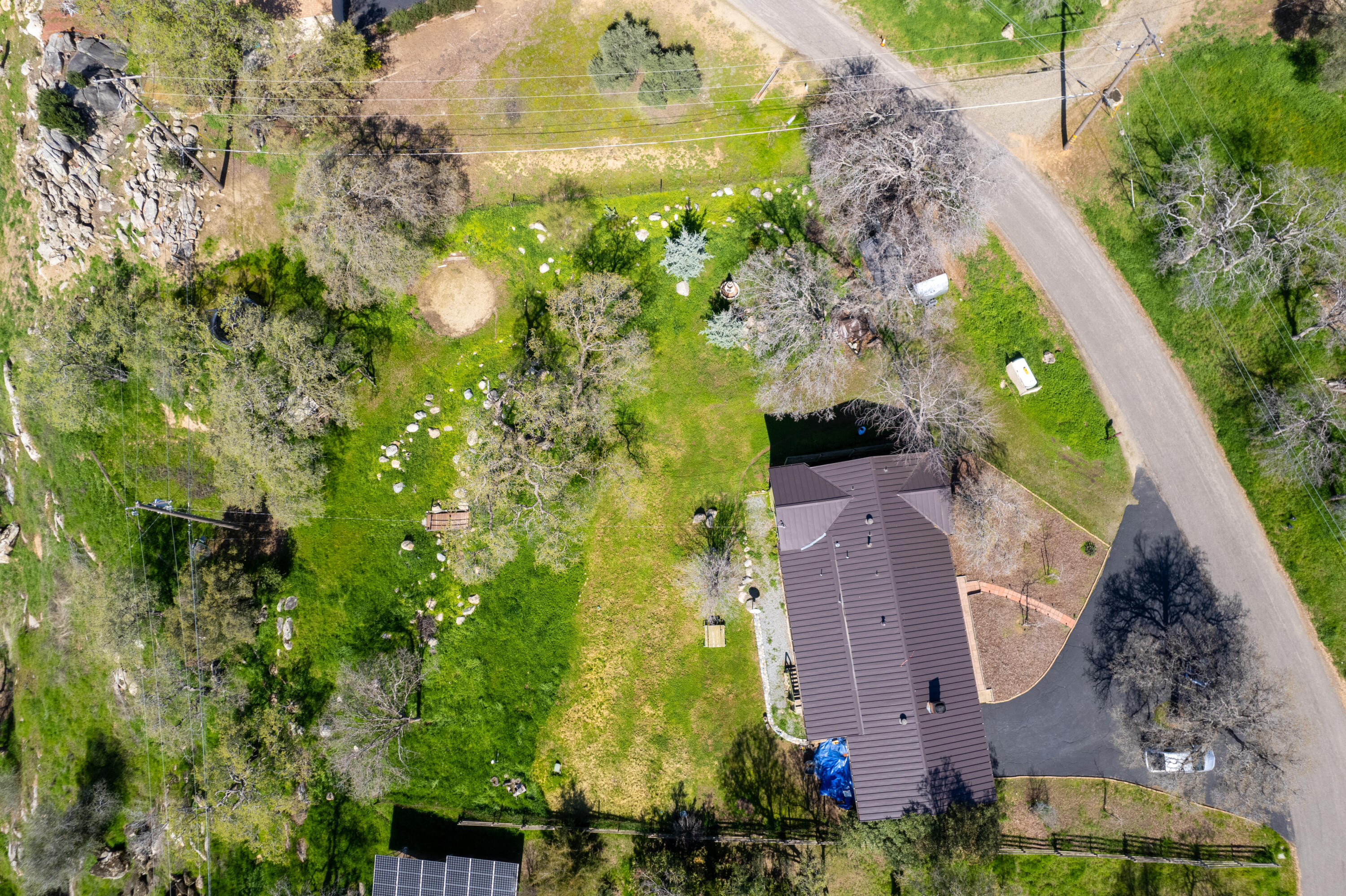 44040 Skyline Drive Three Rivers, CA 93271 - Photo 38 of 40 an aerial view of a house with swimming pool and garden space