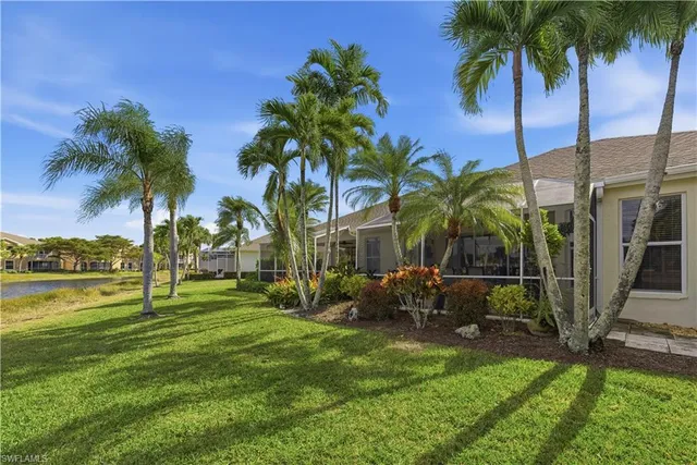 a view of a a dining room with furniture window and wooden floor