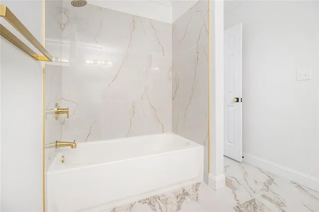 a bathroom with a bathtub