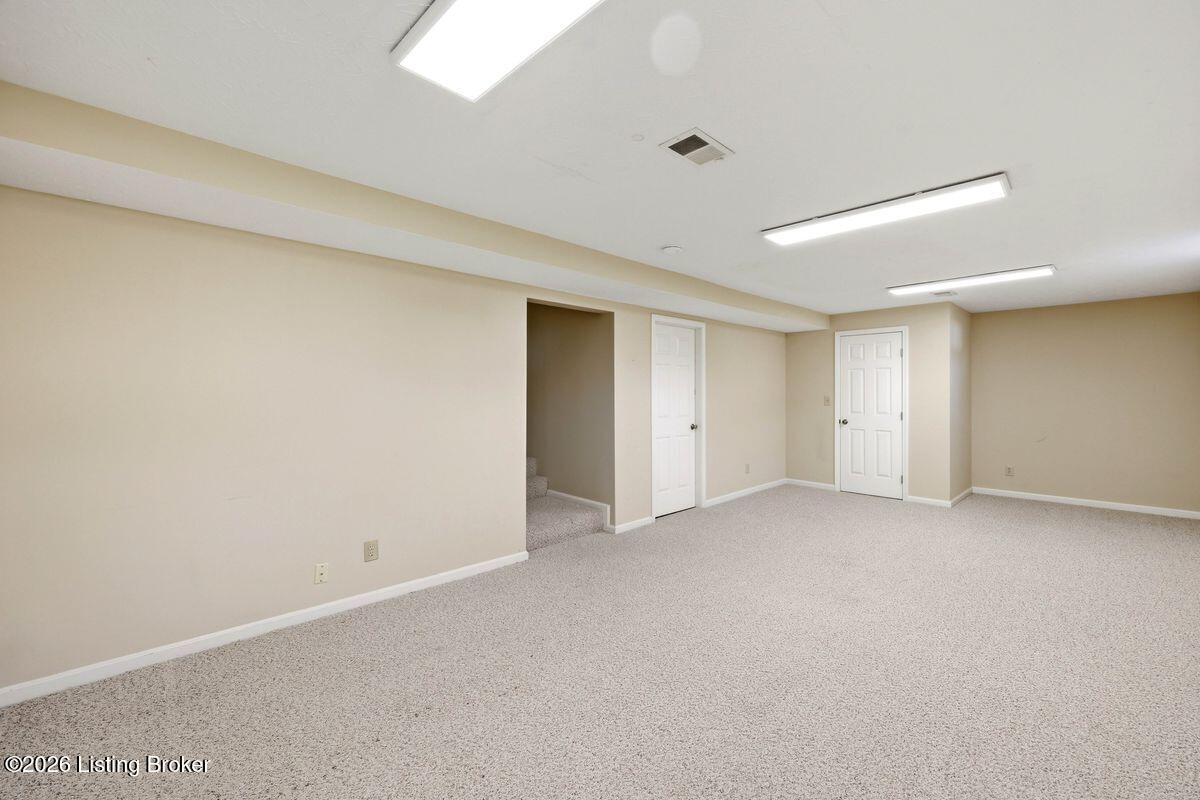 7719 Hermits Run Road Louisville, KY 40291 - Photo 41 of 54 Large finished living space with endless uses; living room, theatre, gym, office, play room