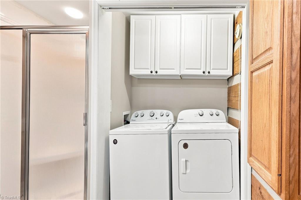 1159 Hawkins Road King, NC 27021 - Photo 24 of 50 Main floor laundry in bathroom
