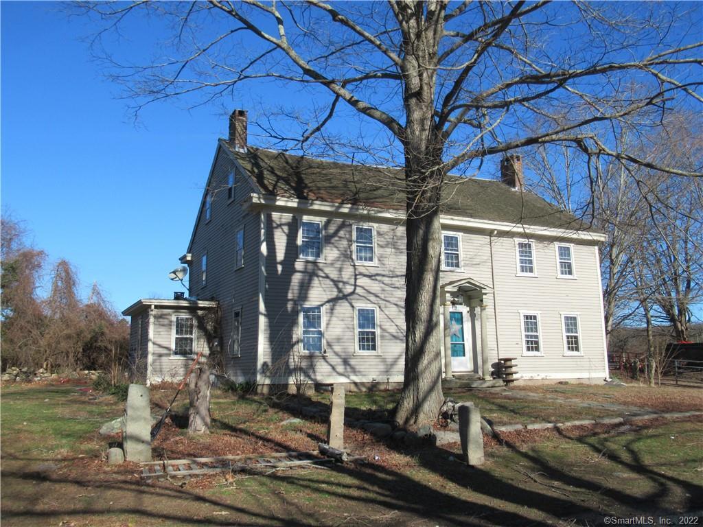 The antique "Cherry Hill" farmhouse on 23 acres