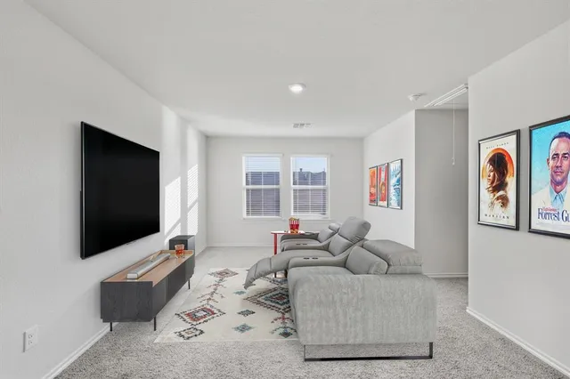 a bathroom with a glass shower door and a glass door