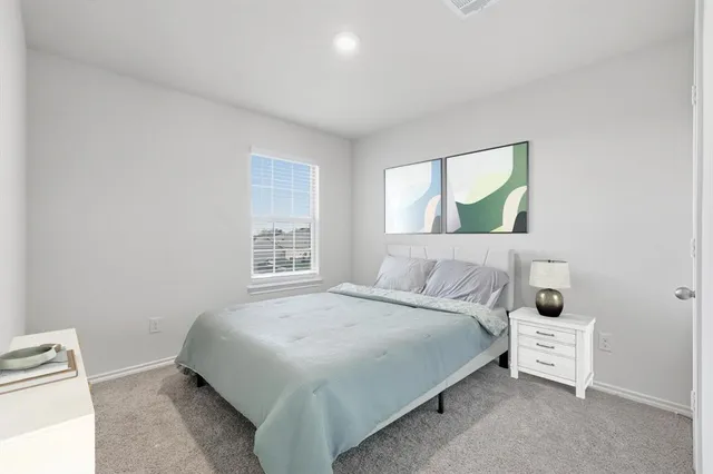 an empty room with a bathroom