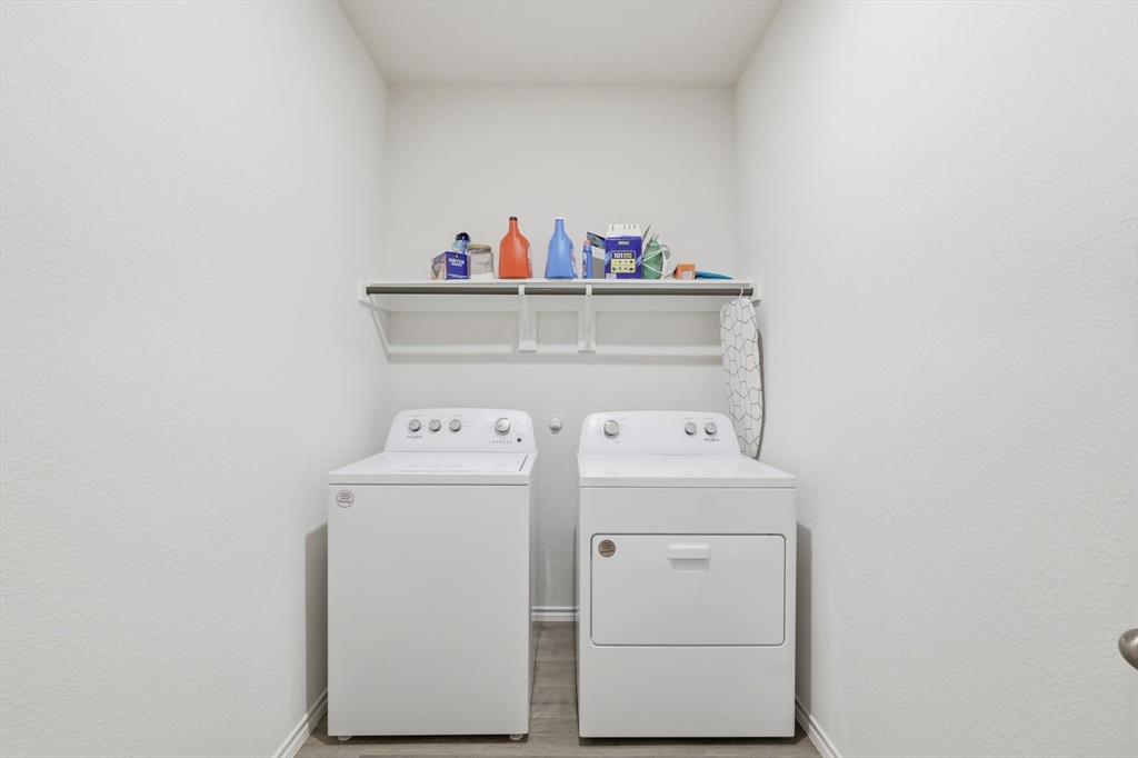 1354 Turkey Run Drive Denton, TX 76207 - Photo 21 of 29 a utility room with dryer and washer