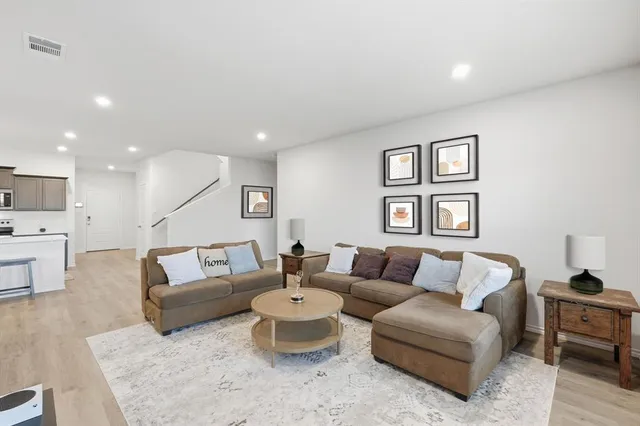 a living room with furniture and a couch