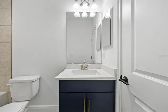 a view of a house with backyard and garden