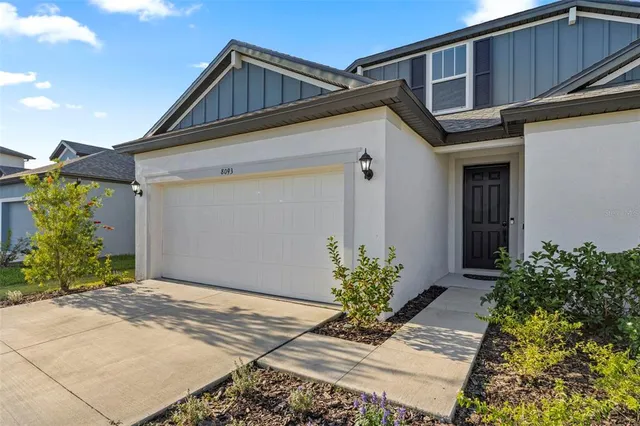 a front view of house with yard