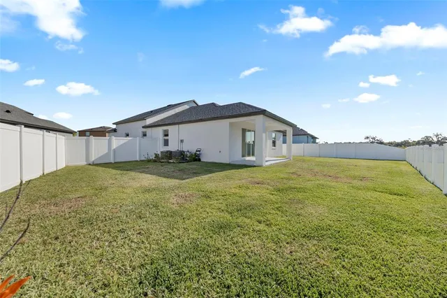 a view of a swimming pool with a lake view