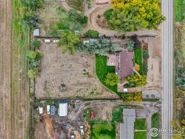 an aerial view of a house with outdoor space