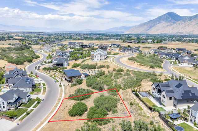 3383 South Mapleton Estates Drive, Unit 18 Mapleton, UT 84664 - Photo 5 of 11 Expansive land parcel featuring natural vegetation and surrounding residential development