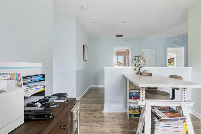 an aerial view of a house with yard swimming pool and outdoor seating
