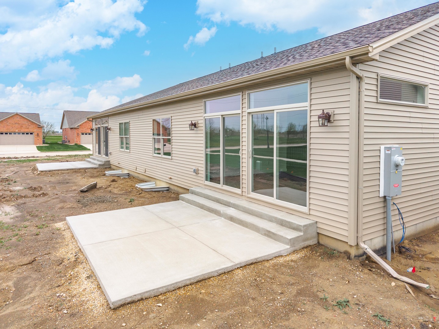 1922 Dunraven Road Bloomington, IL 61704 - Photo 18 of 55 a house view with a backyard space