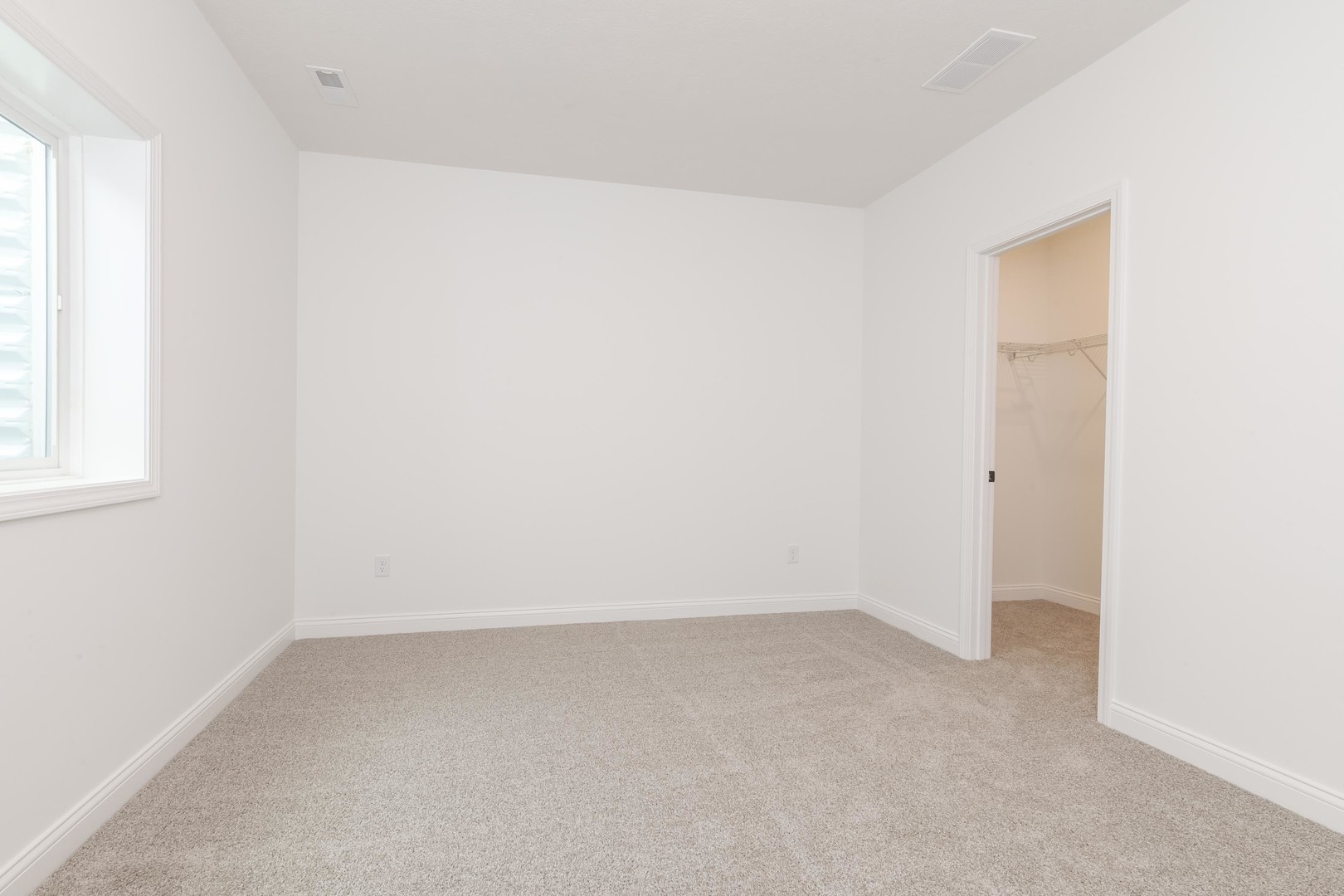 1922 Dunraven Road Bloomington, IL 61704 - Photo 46 of 55 an empty room with a window