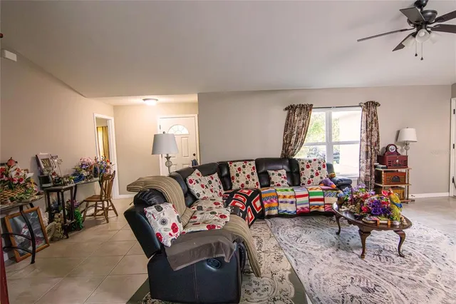 a bed room with furniture and a window