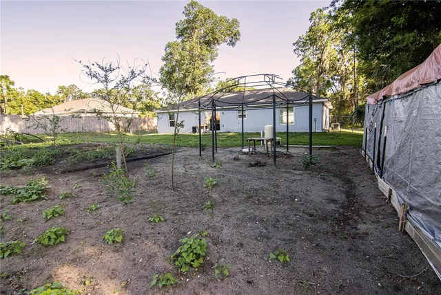 a view of a yard in front of a house