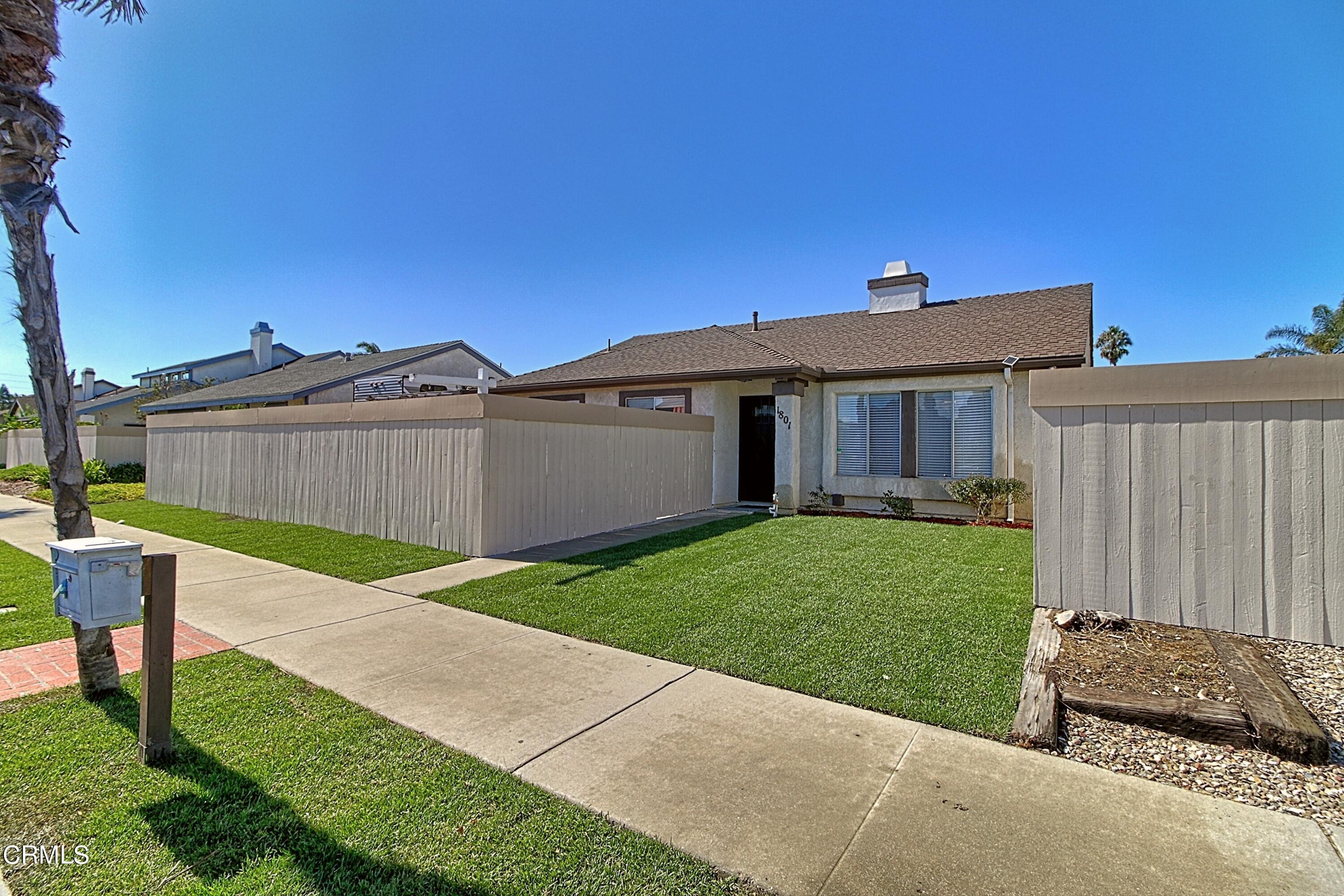 1801 Masthead Drive Oxnard, CA 93035 - Photo 2 of 27 a front view of a house with garden