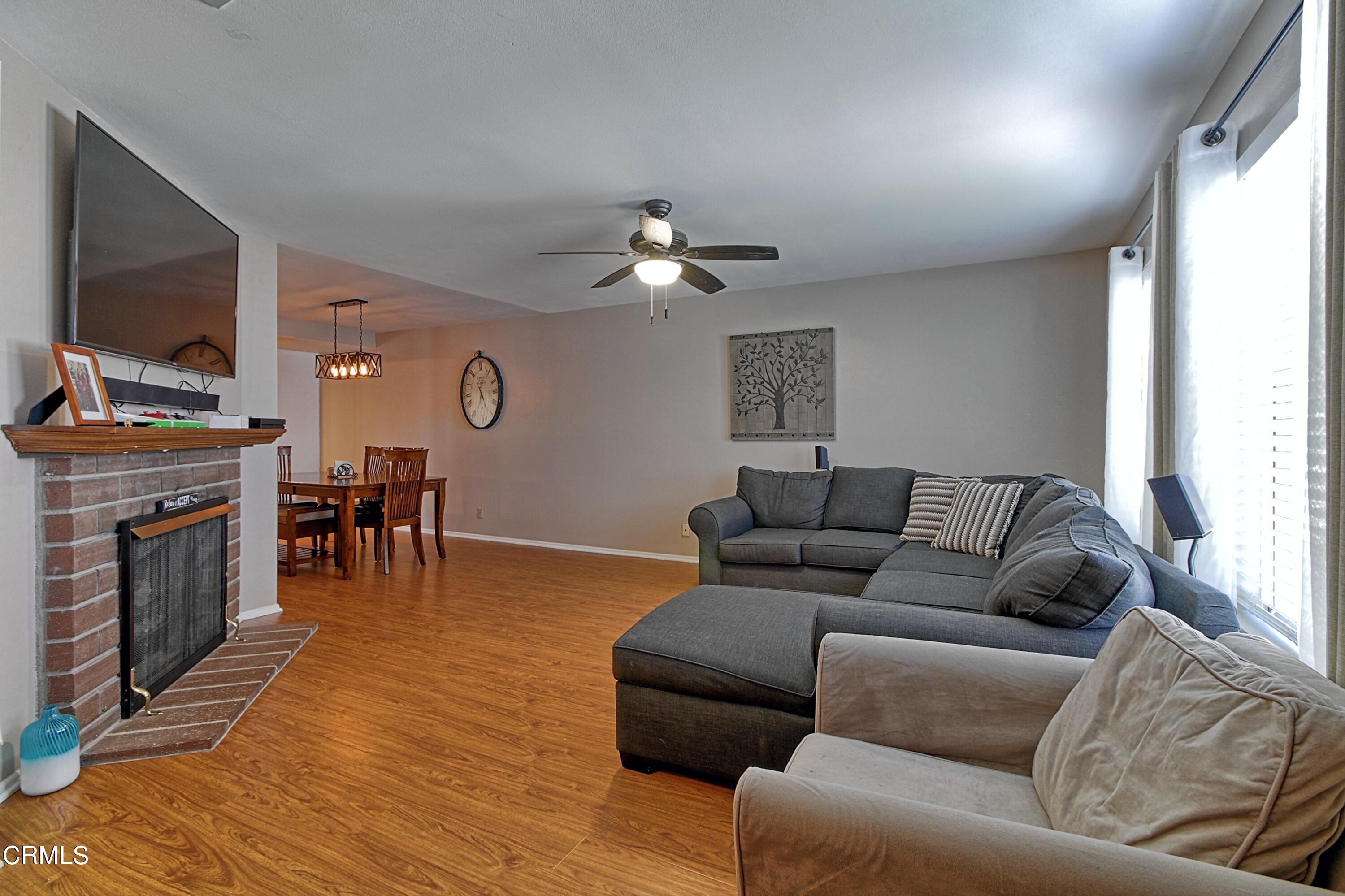 1801 Masthead Drive Oxnard, CA 93035 - Photo 12 of 27 a living room with furniture and a fireplace