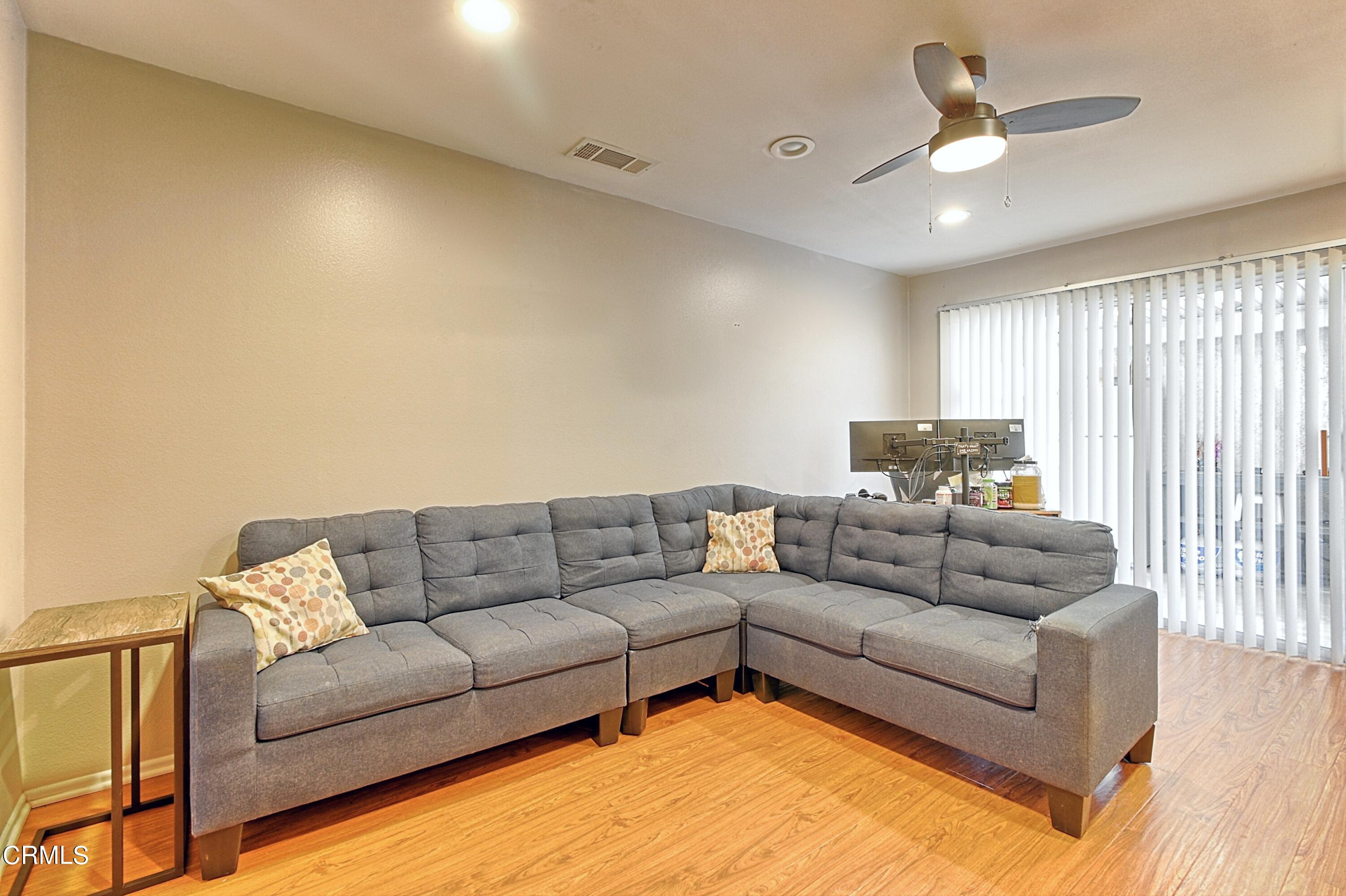 1801 Masthead Drive Oxnard, CA 93035 - Photo 20 of 27 a living room with furniture and a couch