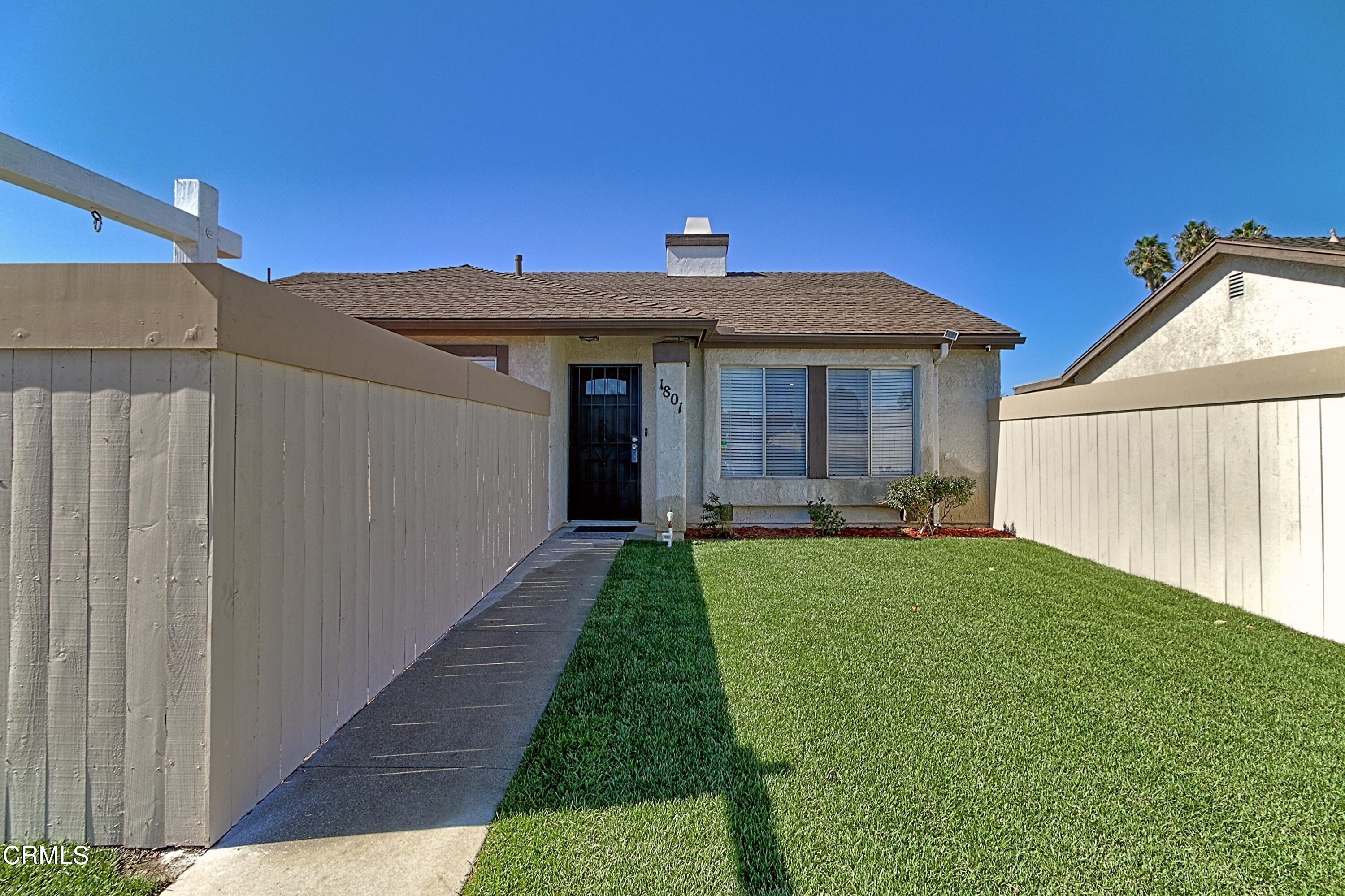 1801 Masthead Drive Oxnard, CA 93035 - Photo 3 of 27 a front view of a house with yard