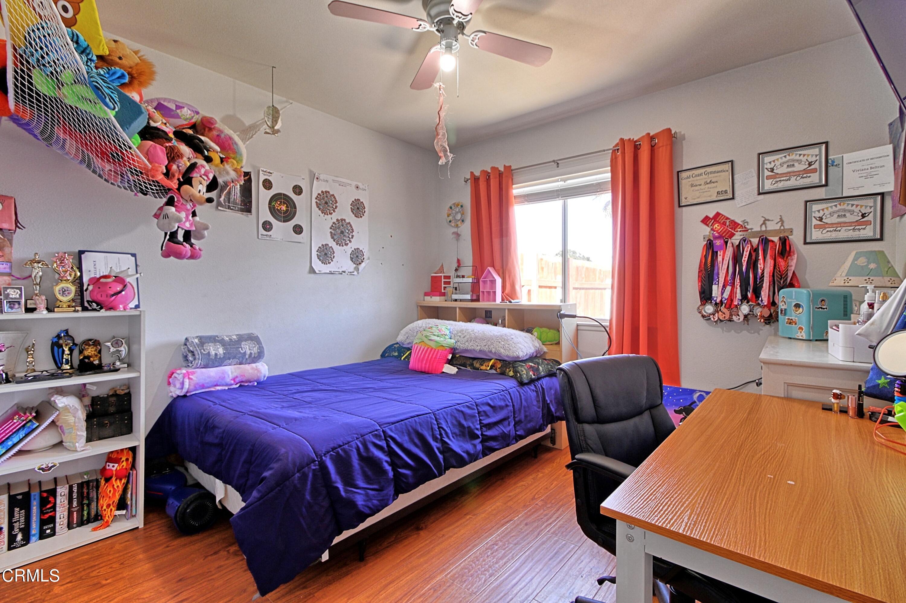 1801 Masthead Drive Oxnard, CA 93035 - Photo 27 of 27 a bedroom with a bed and a window