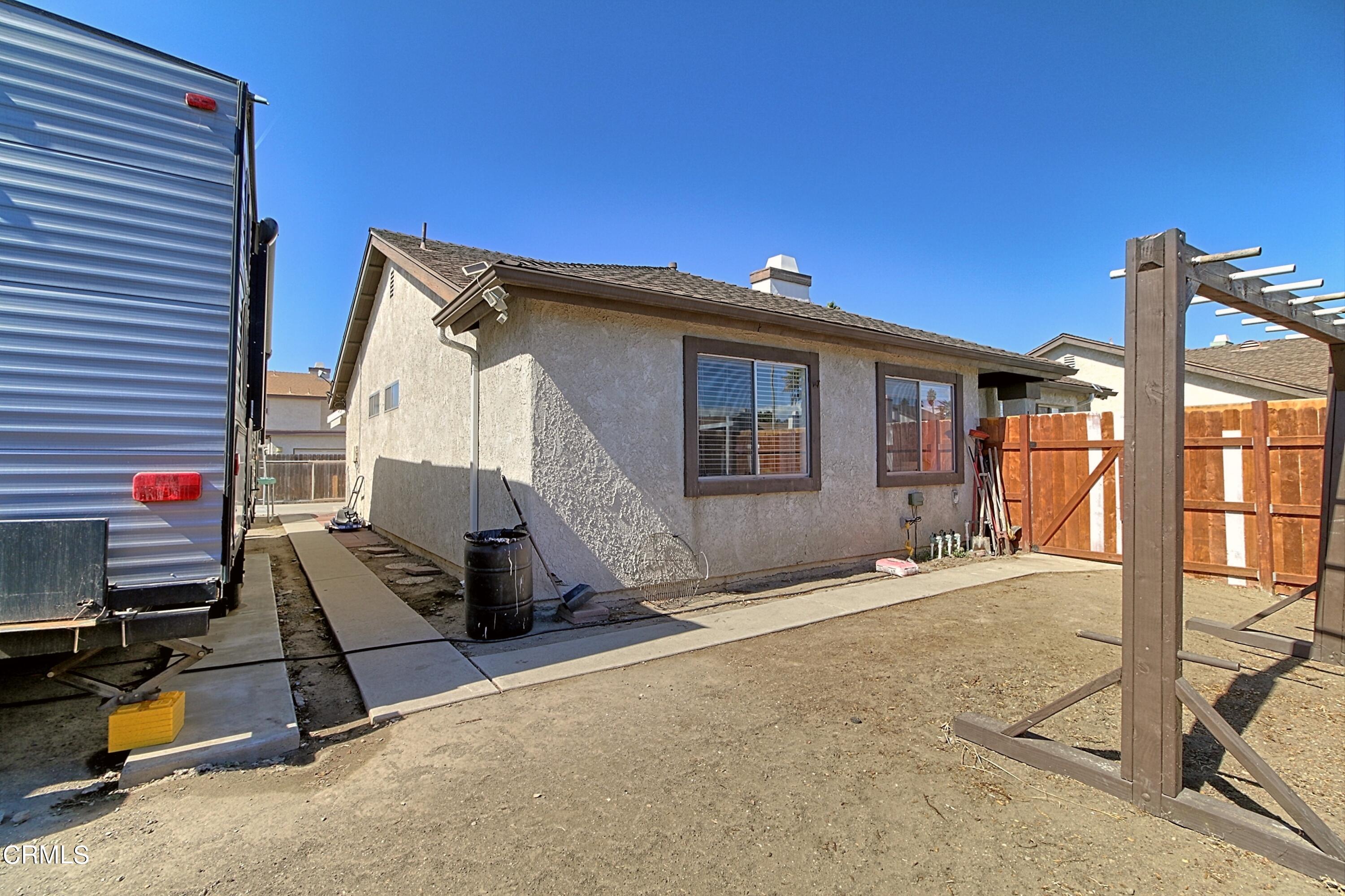 1801 Masthead Drive Oxnard, CA 93035 - Photo 9 of 27 a view of a house with backyard and furniture