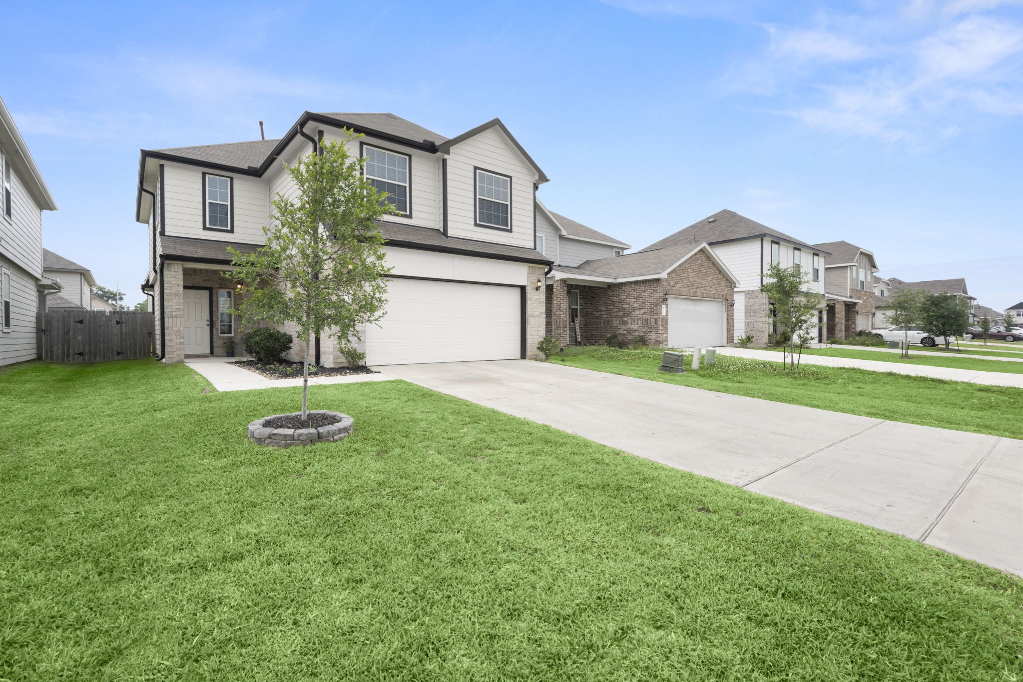 4915 Blue Jacaranda Way Spring, TX 77373 - Photo 2 of 30 The long driveway allows for plenty of parking.