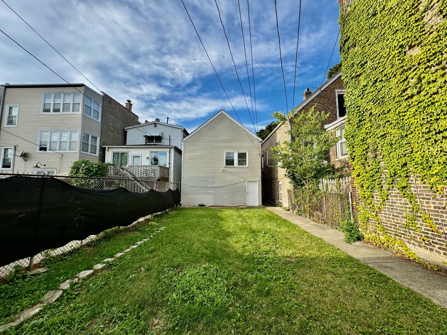 2011 West 22nd Place, Unit 1 Chicago, IL 60608 - Photo 12 of 13 a view of a back yard of the house