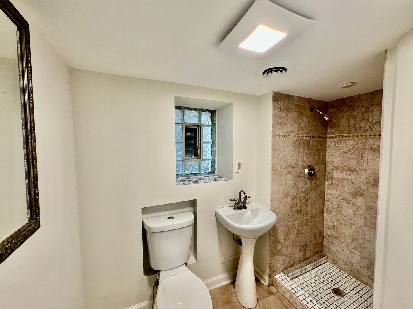 2011 West 22nd Place, Unit 1 Chicago, IL 60608 - Photo 10 of 13 a bathroom with a sink toilet and shower
