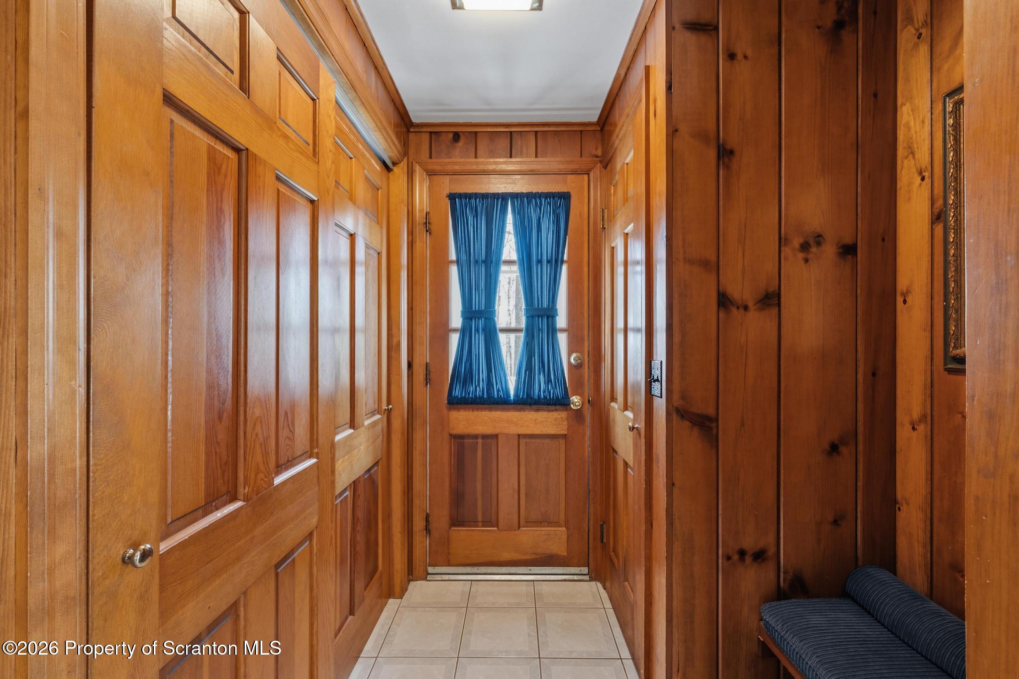 202 Woodlea Road Glenburn, PA 18414 - Photo 15 of 28 a view of a hallway with wooden floor and entryway