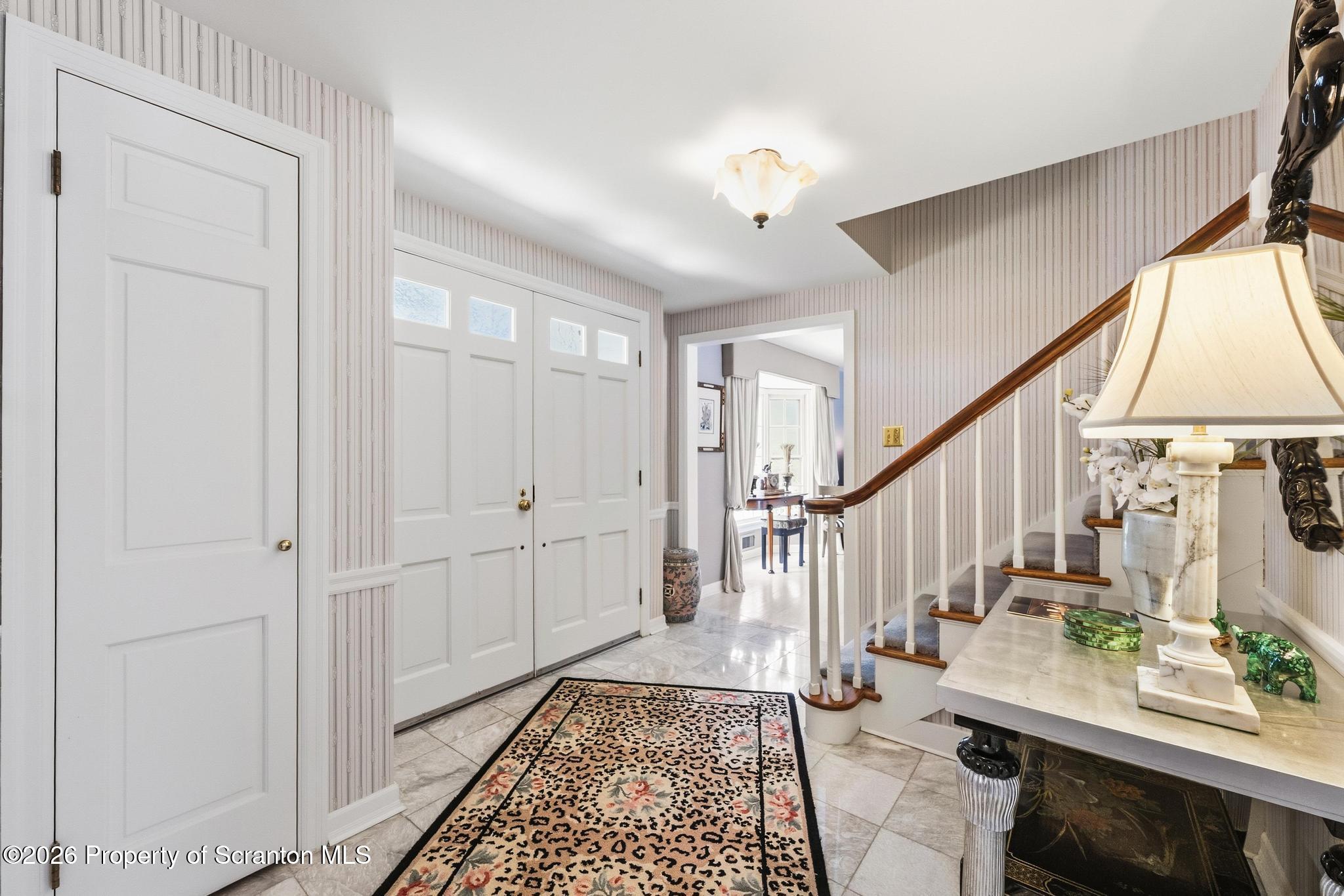 202 Woodlea Road Glenburn, PA 18414 - Photo 3 of 28 a view of entryway with wooden floor