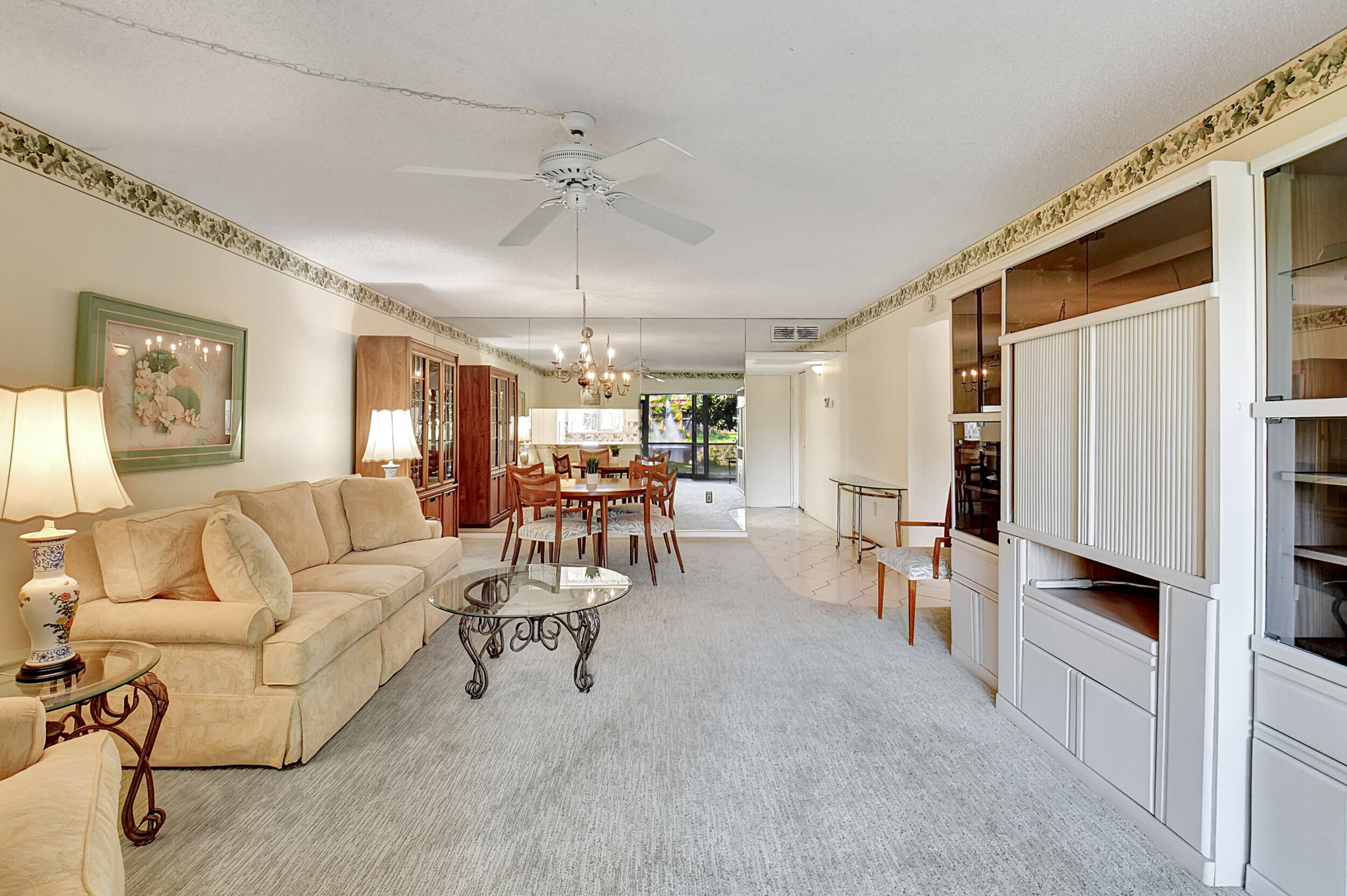 872 Southwest 9th St Circle, Unit 102 Boca Raton, FL 33486 - Photo 12 of 33 Living to Kitchen