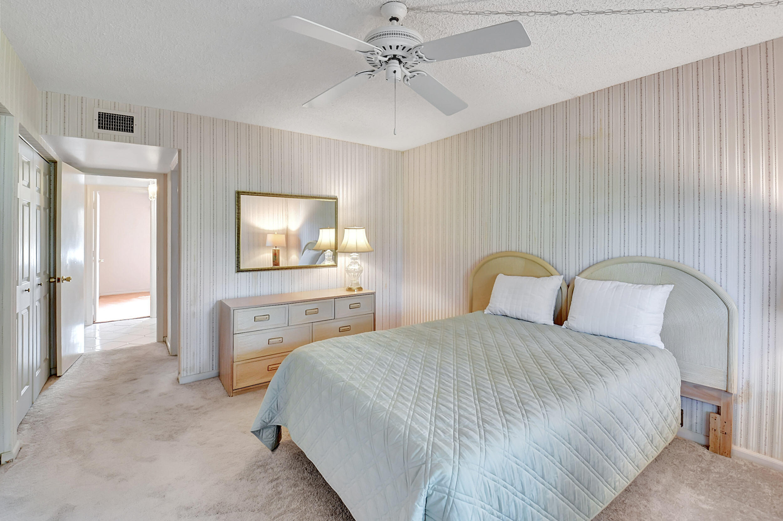 872 Southwest 9th St Circle, Unit 102 Boca Raton, FL 33486 - Photo 19 of 33 Spacious Primary Bedroom