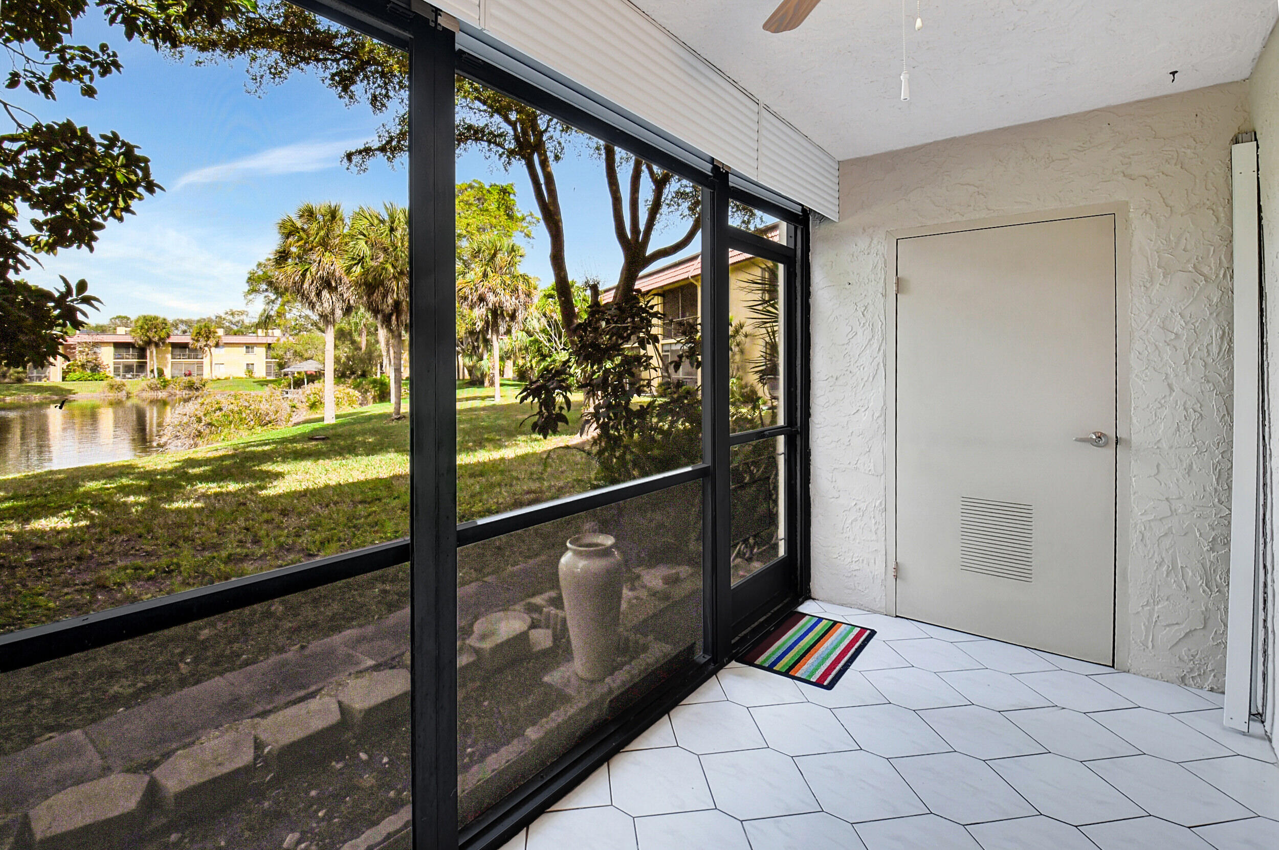 872 Southwest 9th St Circle, Unit 102 Boca Raton, FL 33486 - Photo 8 of 33 Patio with Storage Closet