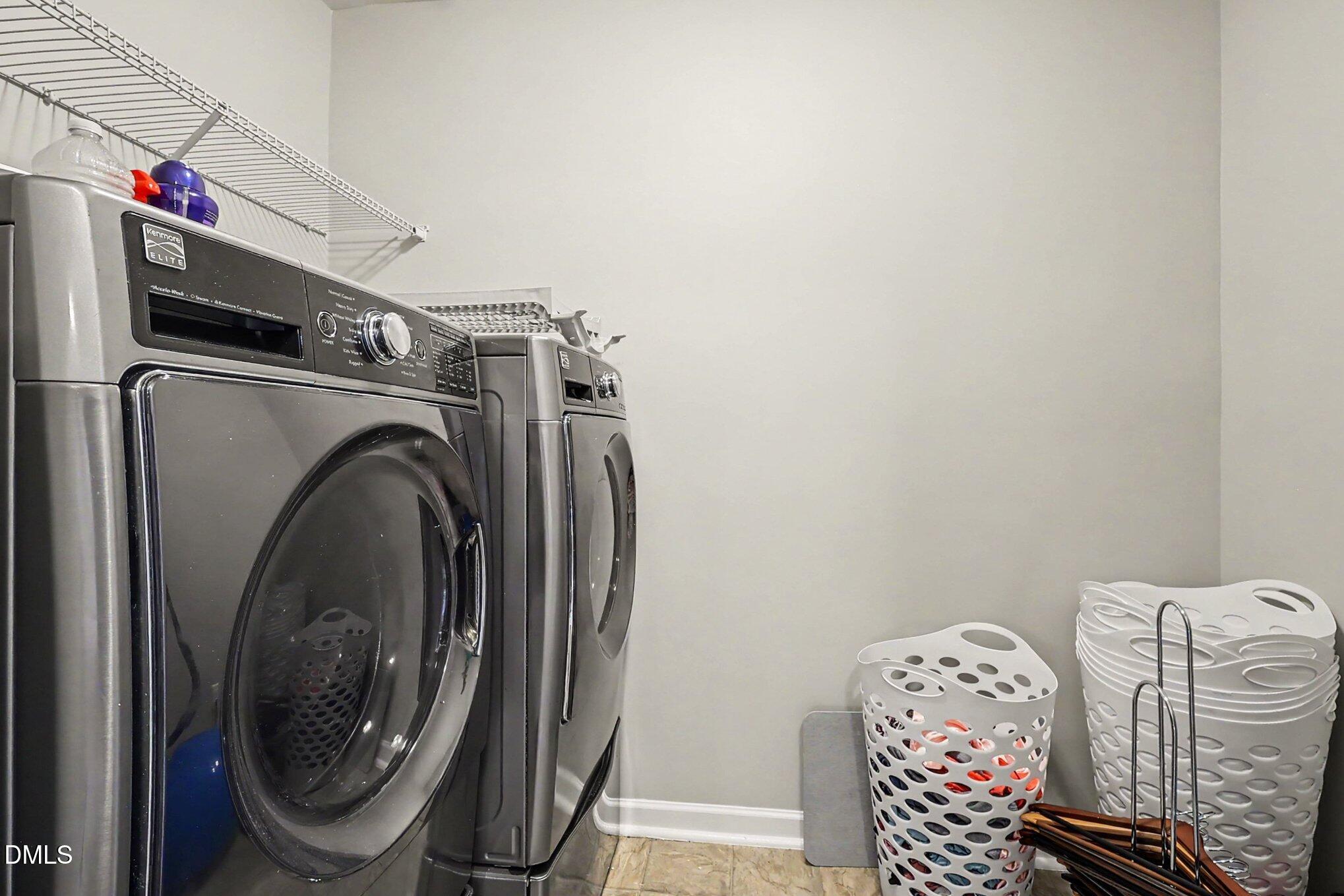 4366 Auburn Hills Drive Raleigh, NC 27616 - Photo 25 of 40 a utility room with dryer and washer