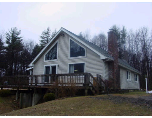 a view of house with outdoor space
