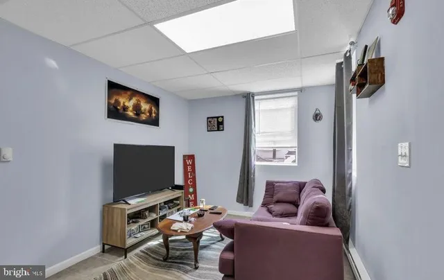 a bedroom with a bed and a walk in closet