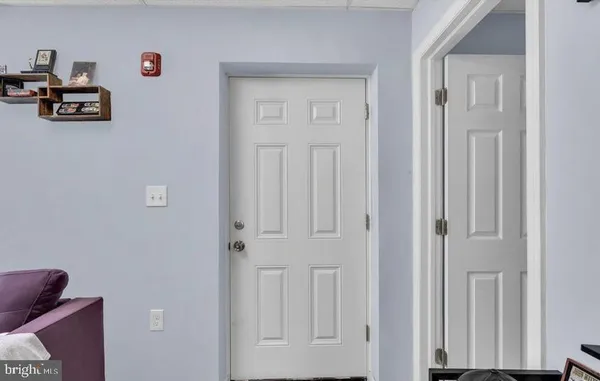 a view of an entryway with livingroom