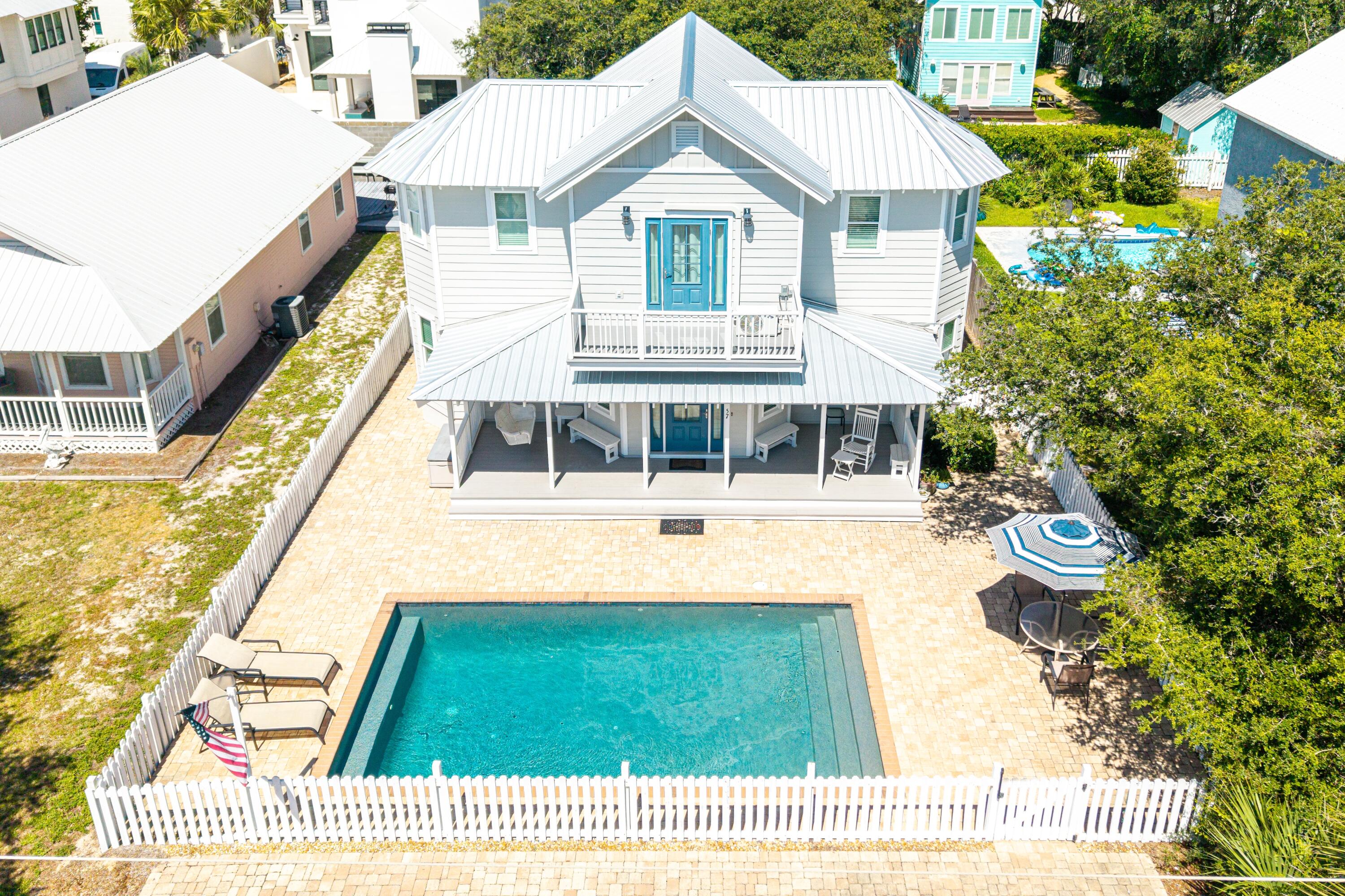 57 Pelayo Avenue Santa Rosa Beach, FL 32459 - Photo 25 of 43 a view of house with garden and entryway