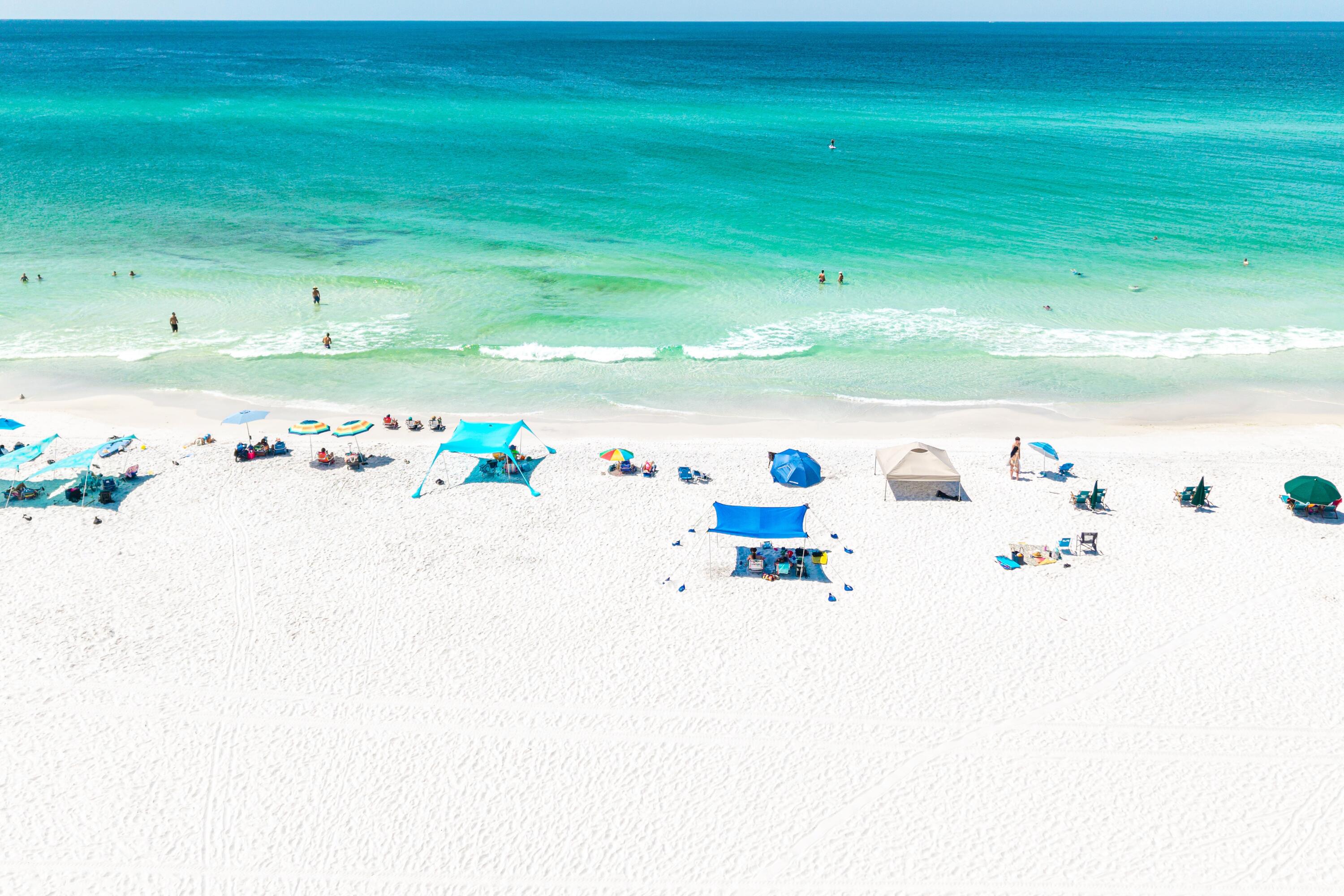 57 Pelayo Avenue Santa Rosa Beach, FL 32459 - Photo 42 of 43 a white cabinet with water heater and wooden cabinets