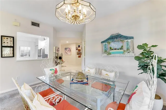 a room with furniture and a chandelier