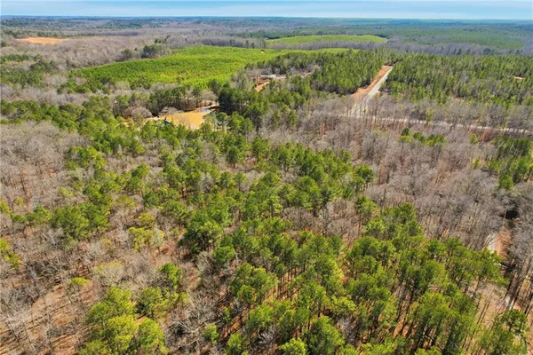 a view of a field with an outdoor space