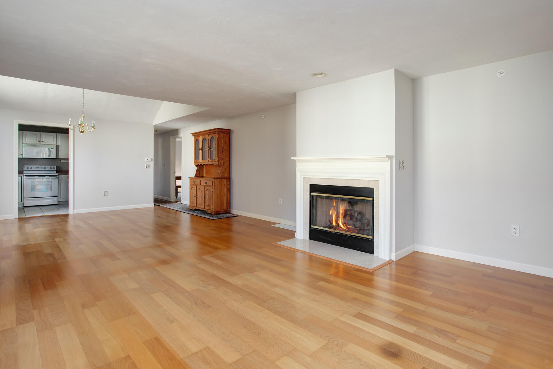 18 Executive Drive Mashpee, MA 02649 - Photo 4 of 22 a view of a livingroom with a fireplace