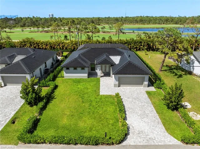 a view of a swimming pool with a garden