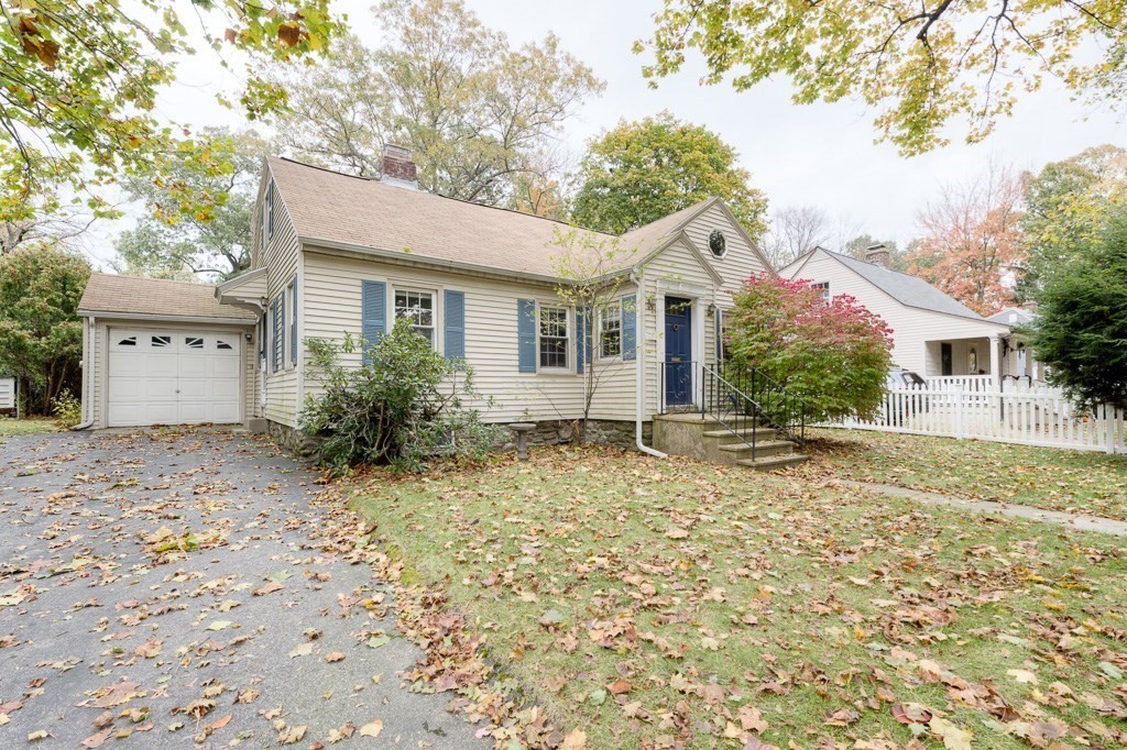 a house with trees in the background