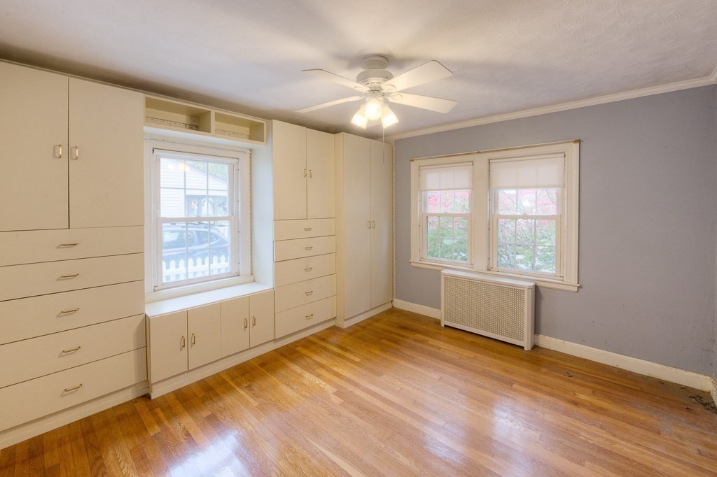 13 Westbrook Road Worcester, MA 01602 - Photo 30 of 41 a view of an empty room with a window and wooden floor