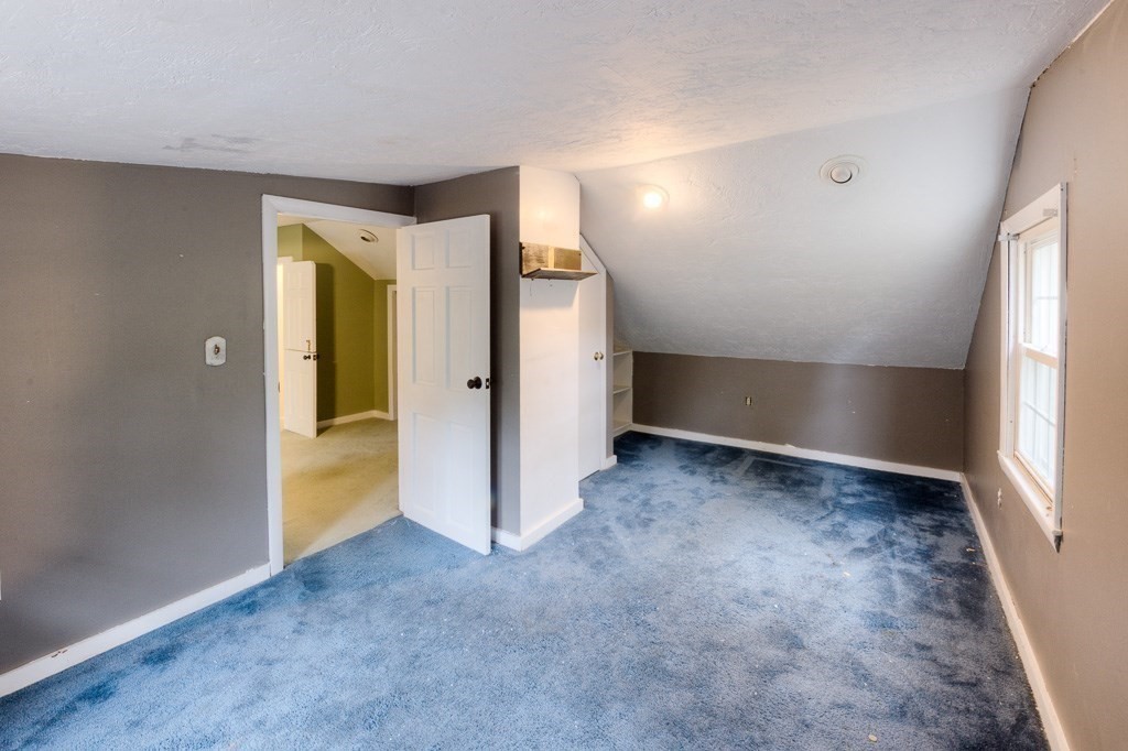 13 Westbrook Road Worcester, MA 01602 - Photo 40 of 41 an empty room with a empty space and windows